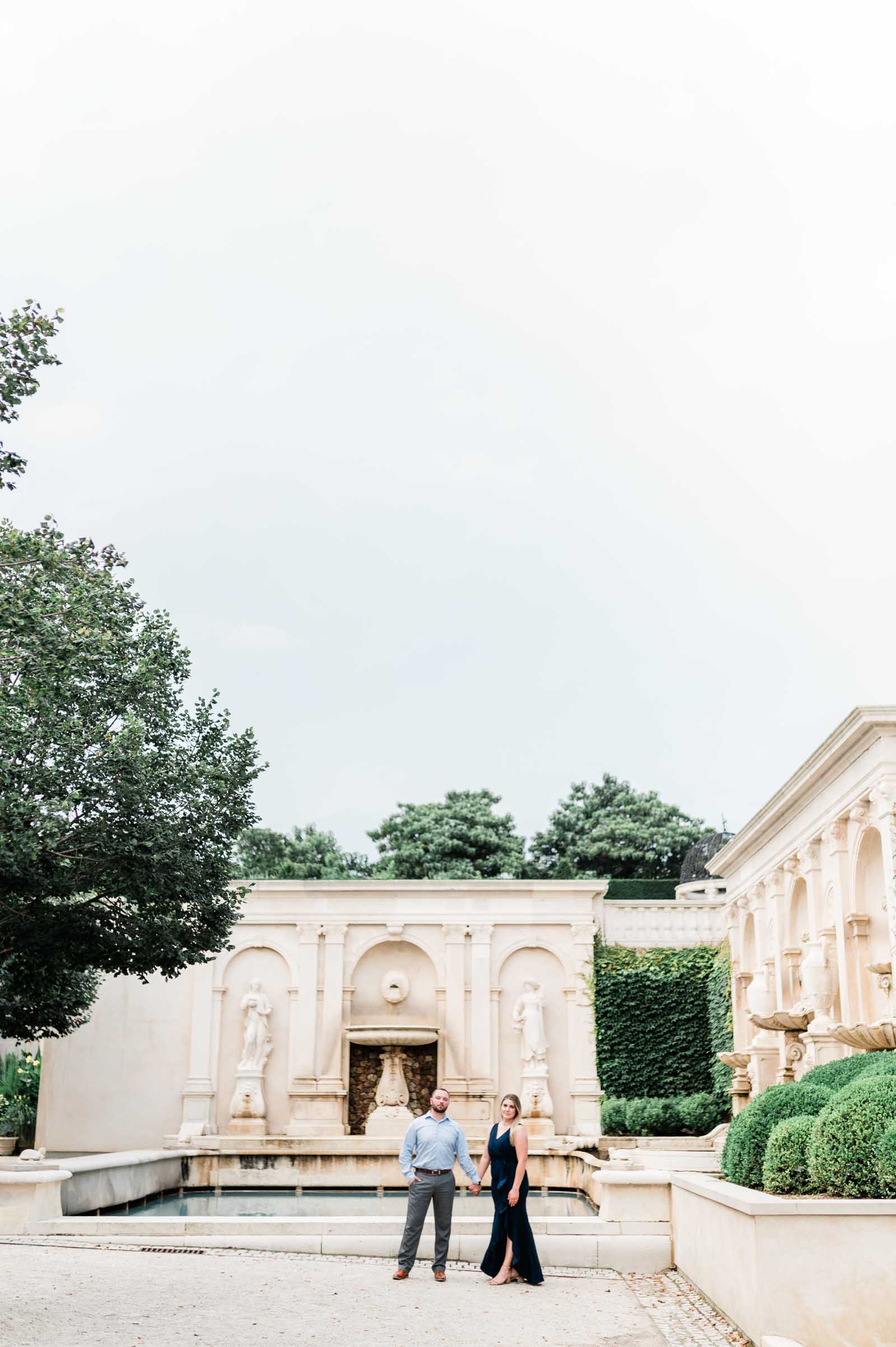 Elegant engagement photo at Longwood Gardens featuring the picturesque botanical backdrop in Philadelphia.