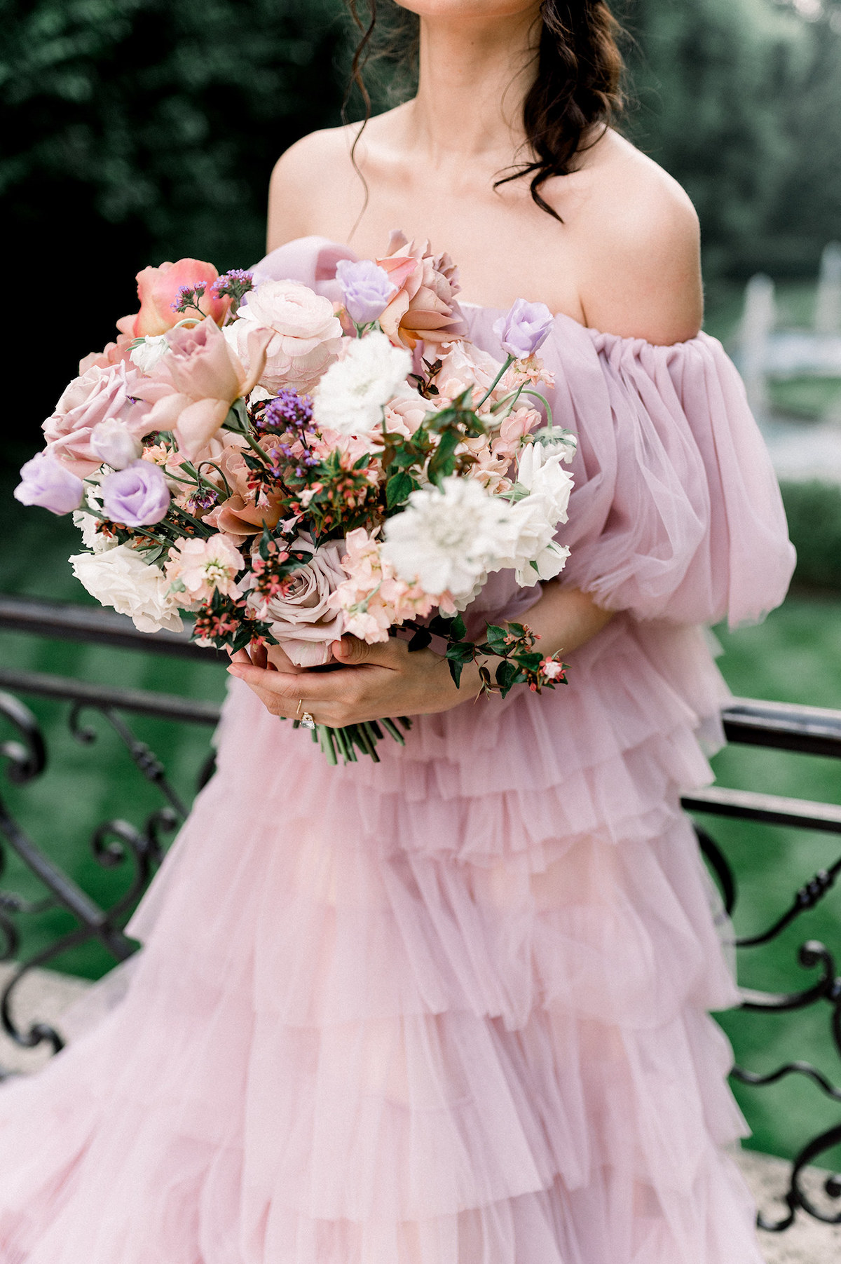Kristiana Enya's floral artistry on display with a magnificent bouquet, bursting with vibrant colors and textures, adding natural elegance to the editorial.