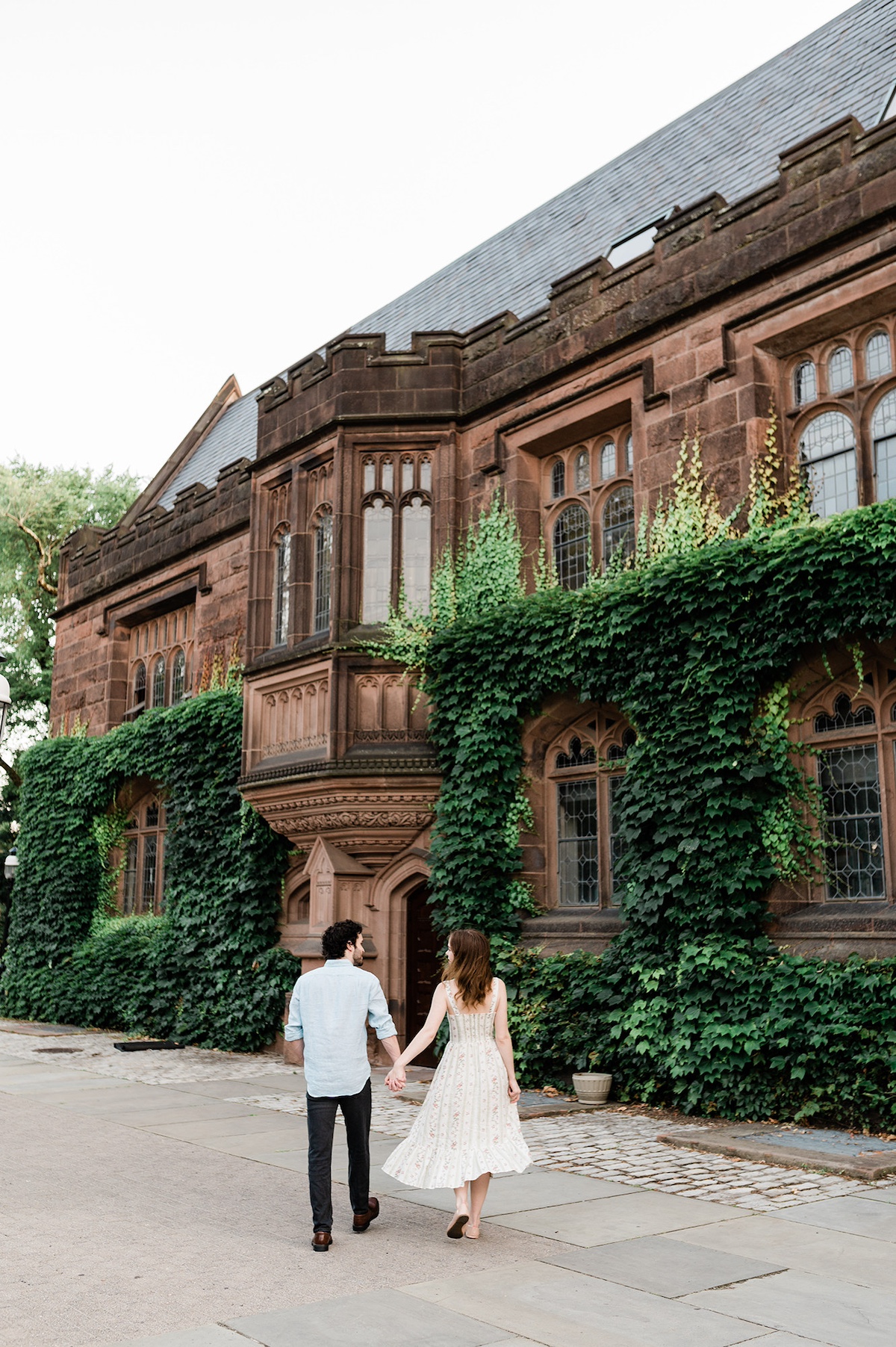 Amidst Princeton's timeless architecture, Page and Christopher share a loving moment, creating memories to last a lifetime.