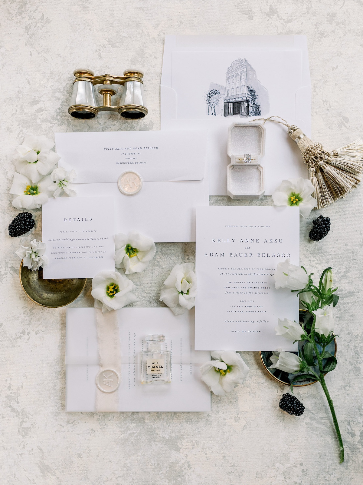An artfully arranged flatlay capturing the details of the invitation suite, exuding classic and timeless charm.