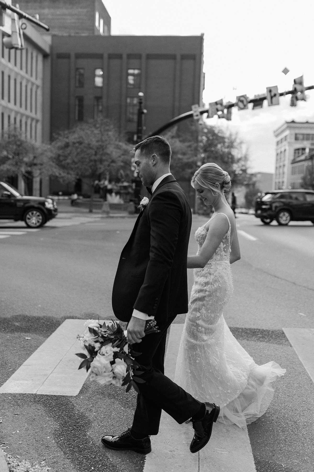 Enchanting editorial walk amidst Lancaster's charm, the newlyweds immersed in the high-end allure of the city's picturesque surroundings.