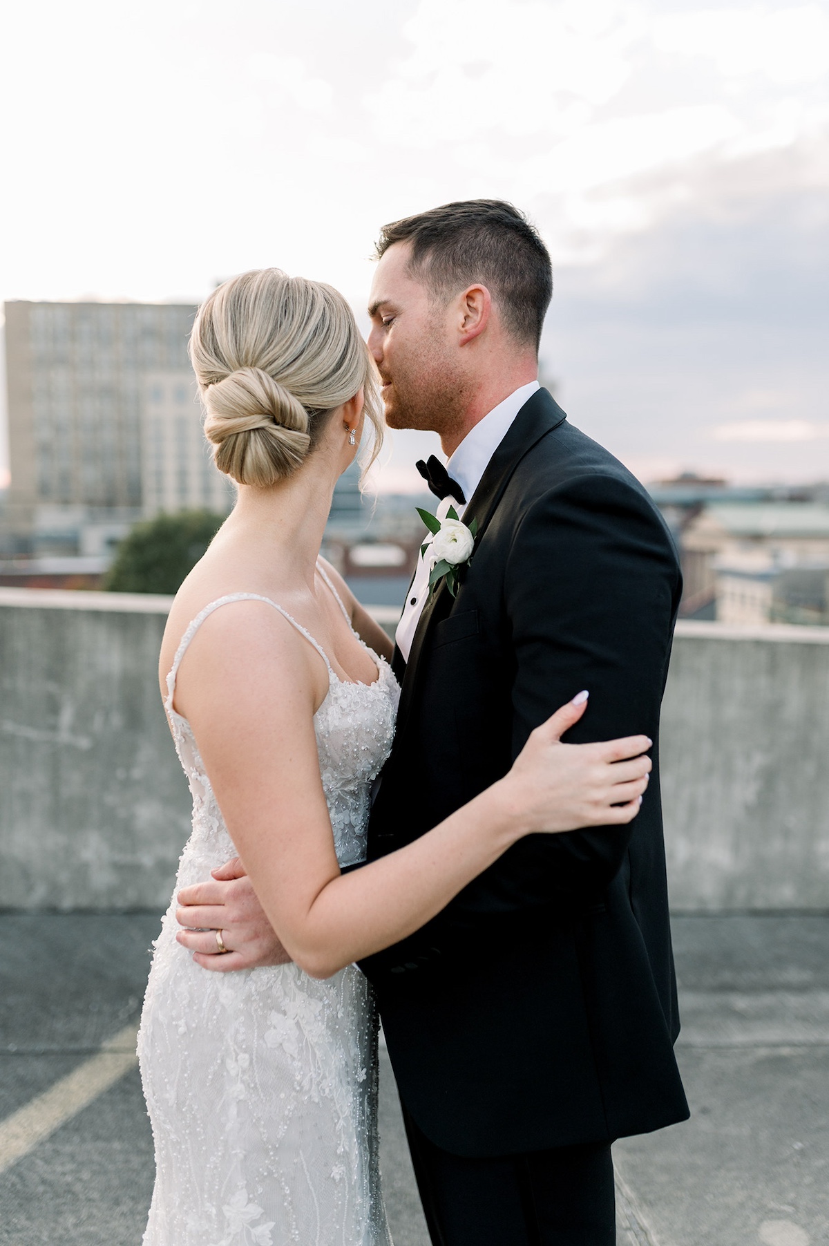 Kelly and Adam share a romantic dance under the Lancaster City sunset, a moment of pure love and joy.