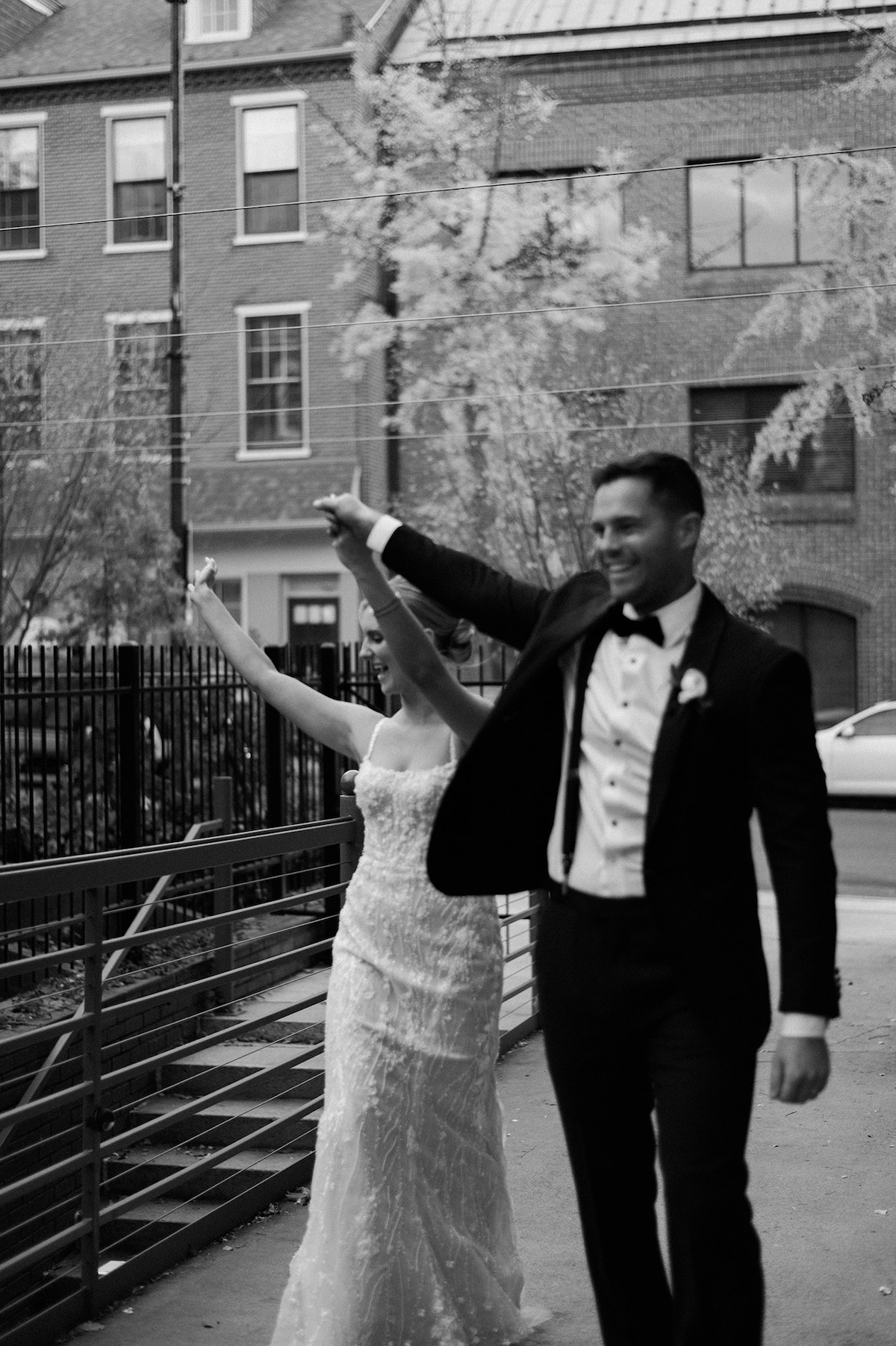 Kelly and Adam make a grand entrance at Excelsior's reception, setting the tone for an evening filled with celebration and joy.