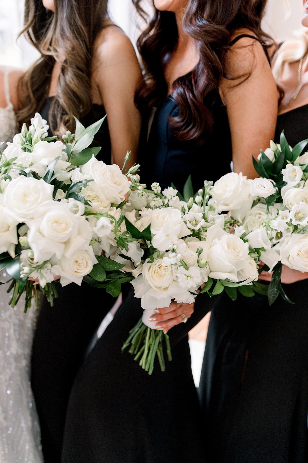 An editorial composition featuring bridesmaids arranging bouquets, a display of high-end floral sophistication.