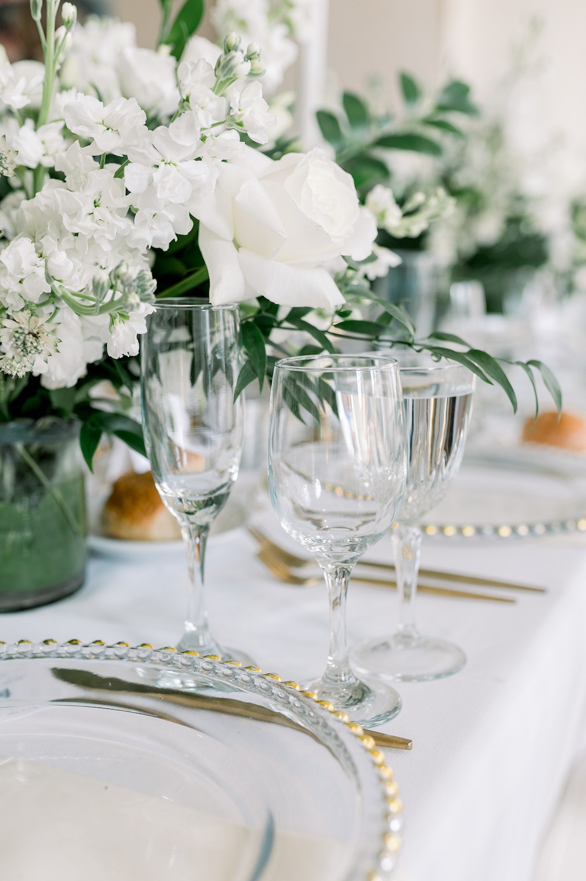 A chic composition highlighting the details of place settings, meticulously arranged to elevate the sophistication of the event.