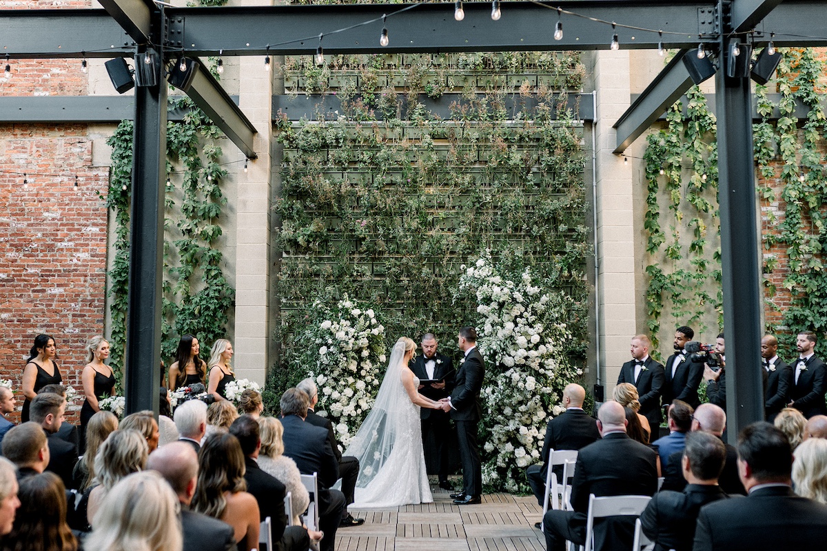 Breathtaking editorial shot of the ceremony backdrop, a scene of high-end beauty enhancing the wedding vows.