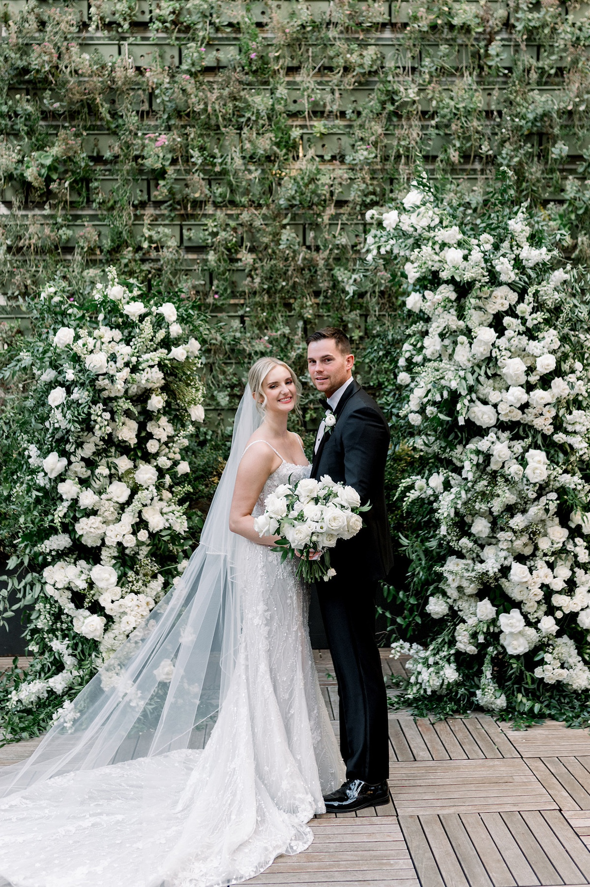 An elegant editorial portrait capturing the just-married bliss of the bride and groom at Excelsior, radiating sophistication and high-end romance.